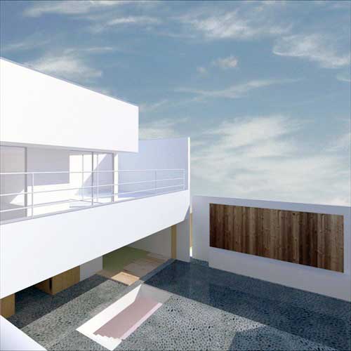 二階、寝室前の坪庭より中庭を見下ろす。和室の前は水盤.